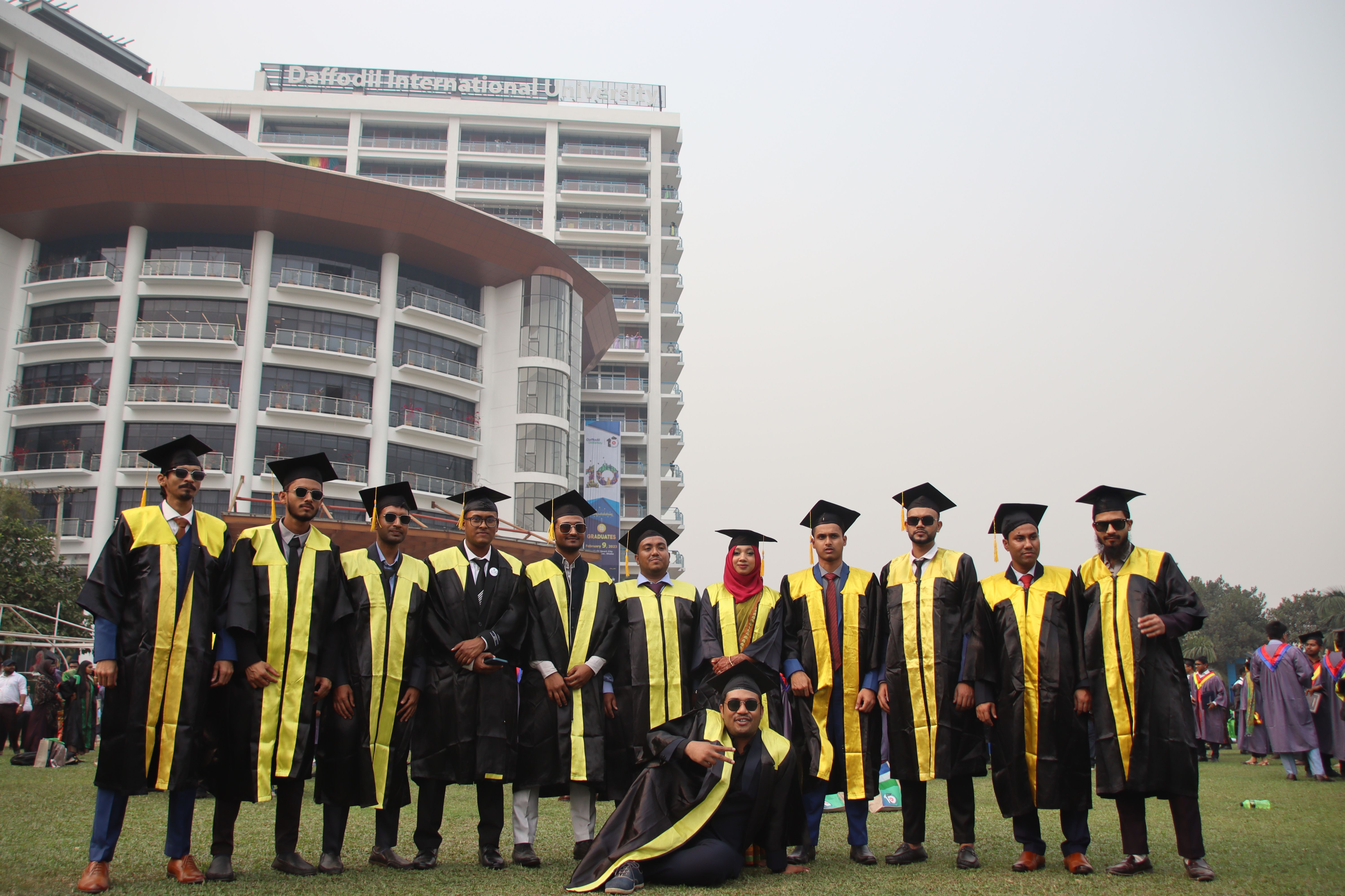 Students celebrating graduation on campus